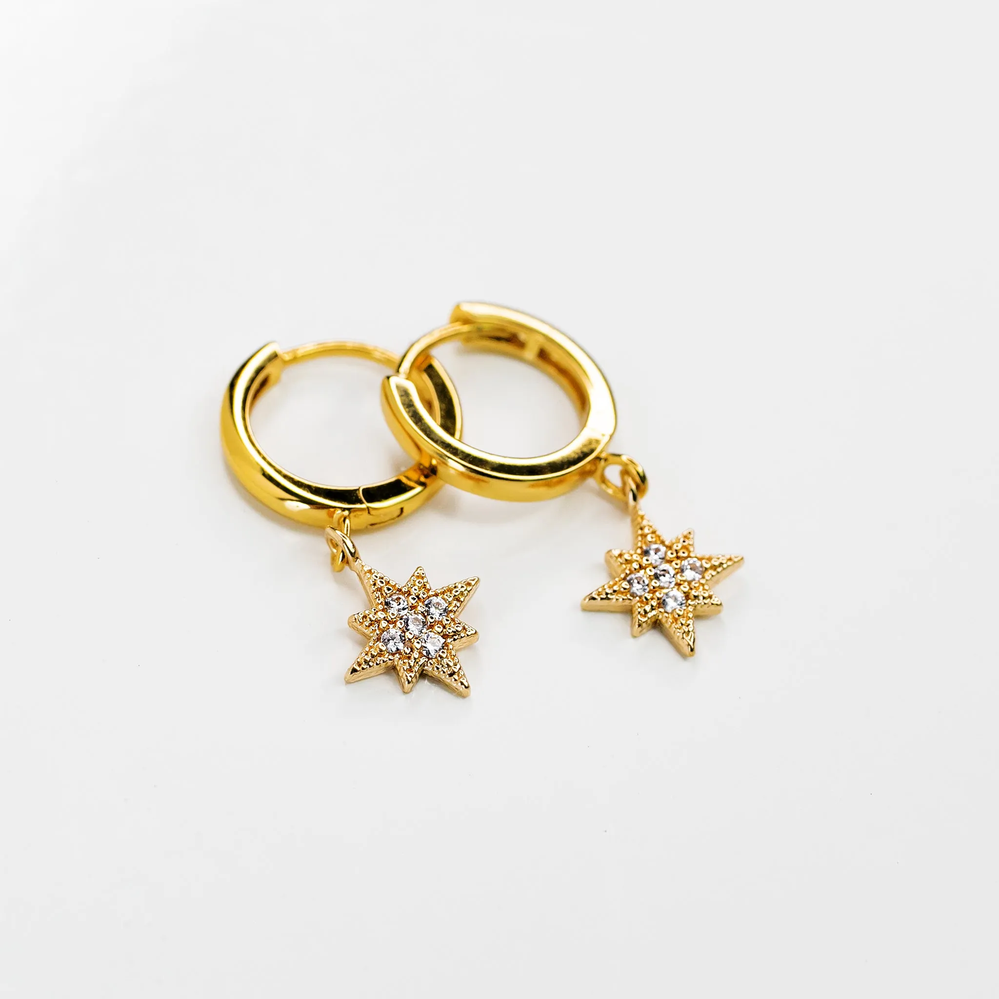 Twinkling Pavé Star Huggie Earrings