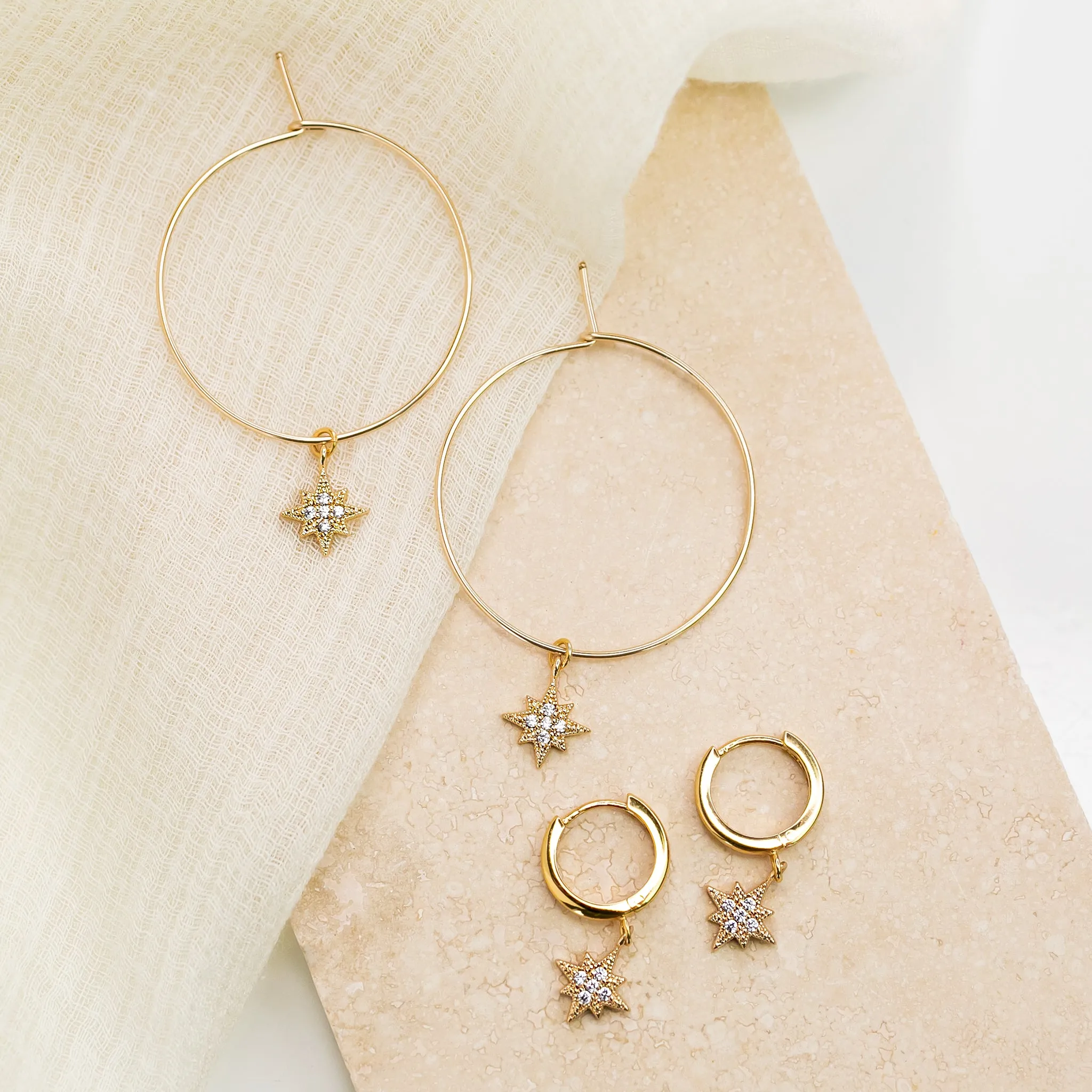 Twinkling Pavé Star Huggie Earrings