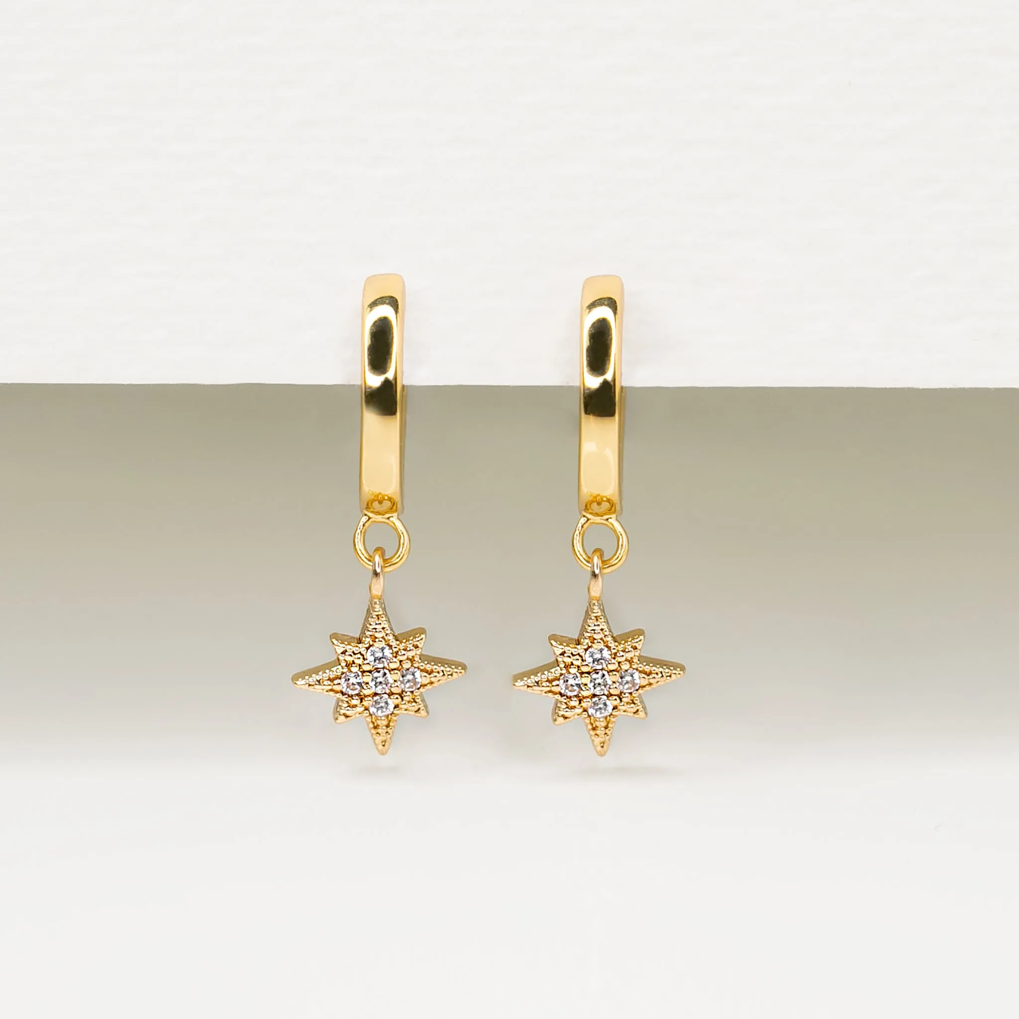 Twinkling Pavé Star Huggie Earrings